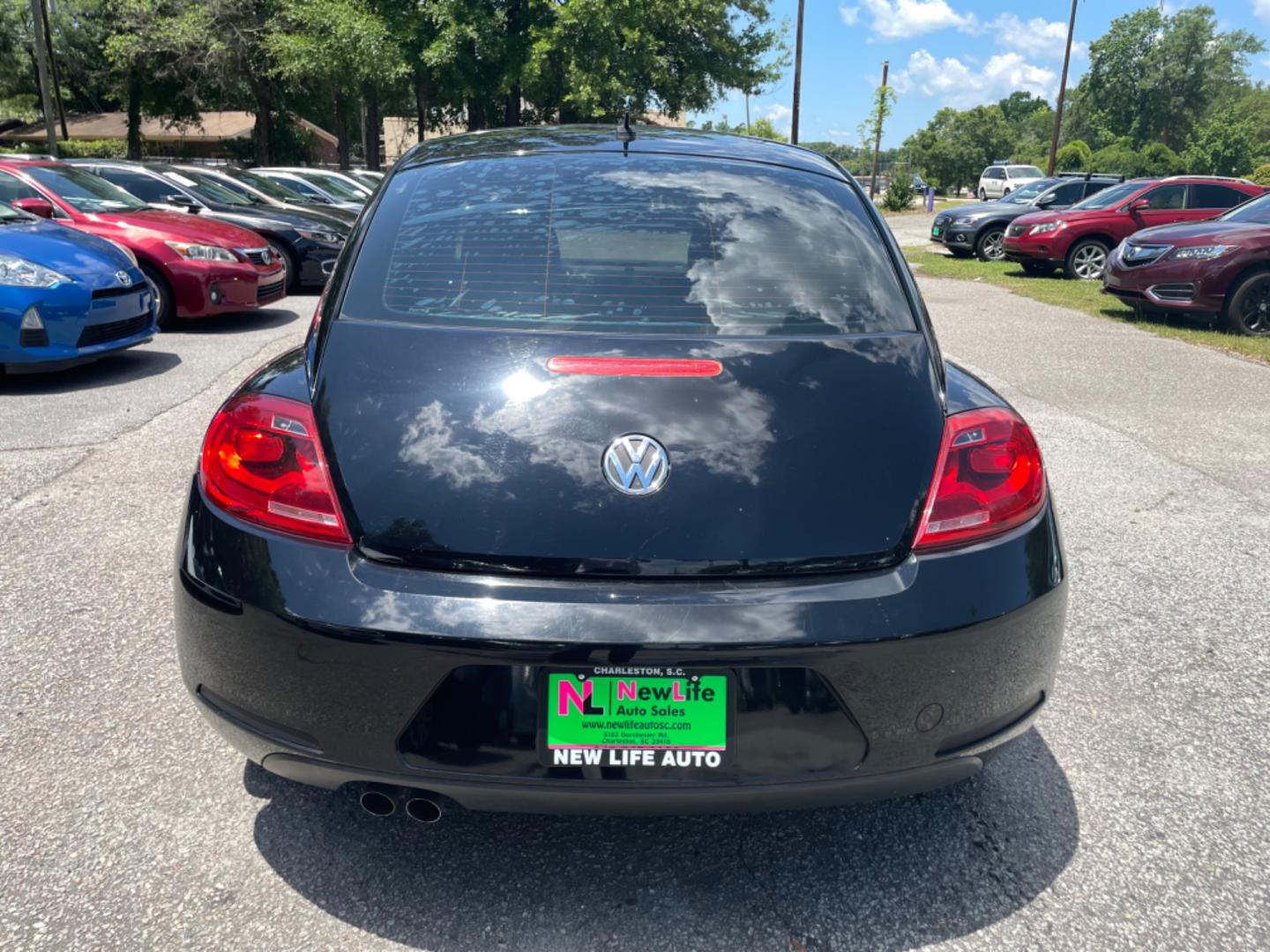 2012 BLACK VOLKSWAGEN BEETLE 2.5L PZEV (3VWJP7AT0CM) with an 2.5L engine, Automatic transmission, located at 5103 Dorchester Rd., Charleston, SC, 29418-5607, (843) 767-1122, 36.245171, -115.228050 - Local Trade-in with Leather, CD/AUX/Bluetooth, Hands-free Phone, Power Windows, Power Locks, Power Mirrors, All-weather Mats, Keyless Entry, Alloy Wheels. Clean CarFax (no accidents reported!) Only 68k miles! Located at New Life Auto Sales! 2023 WINNER for Post & Courier's Charleston's Choice Pre - Photo#6